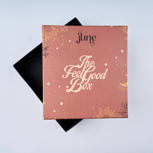 Terra 'The Feel Good Box' packaging with decorative elements on a light blue background