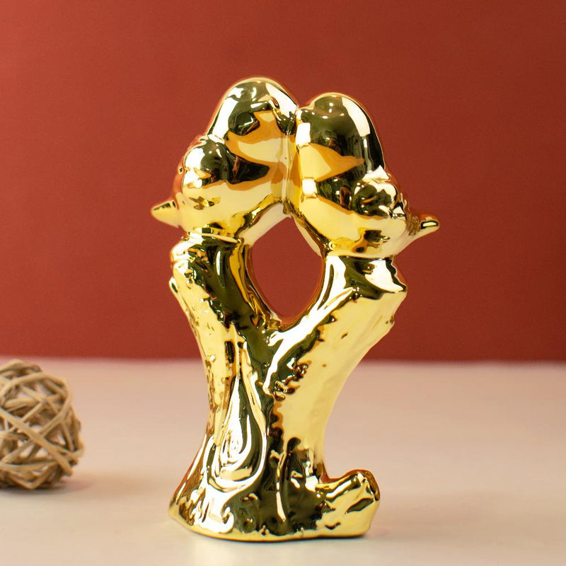 Shimmering Golden Birds on Bark Figurine