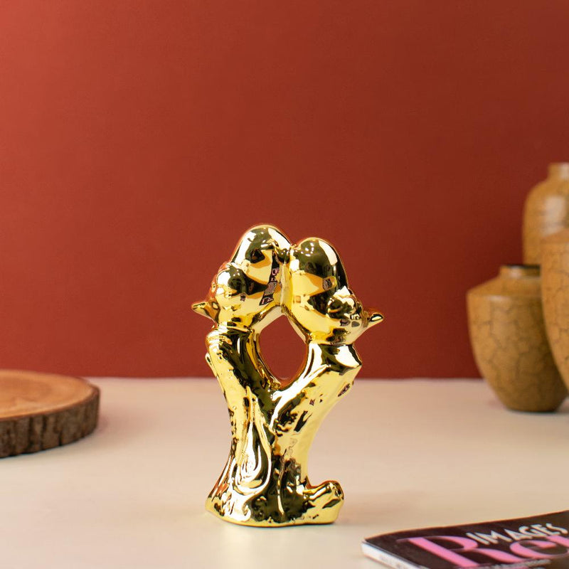 Shimmering Golden Birds on Bark Figurine