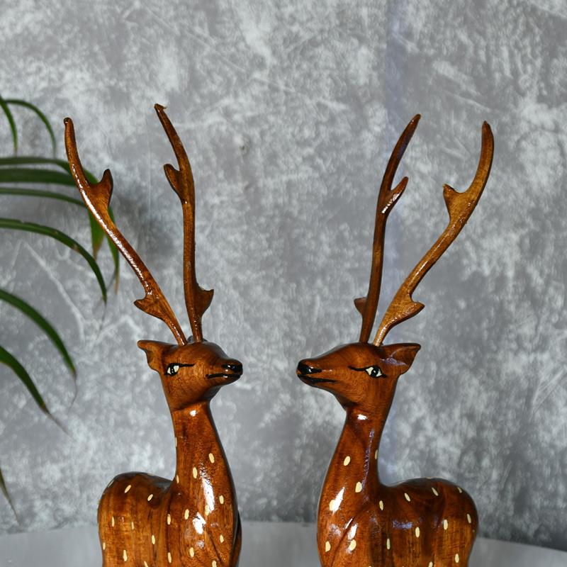 Pair Of Wooden Sitting Deer
