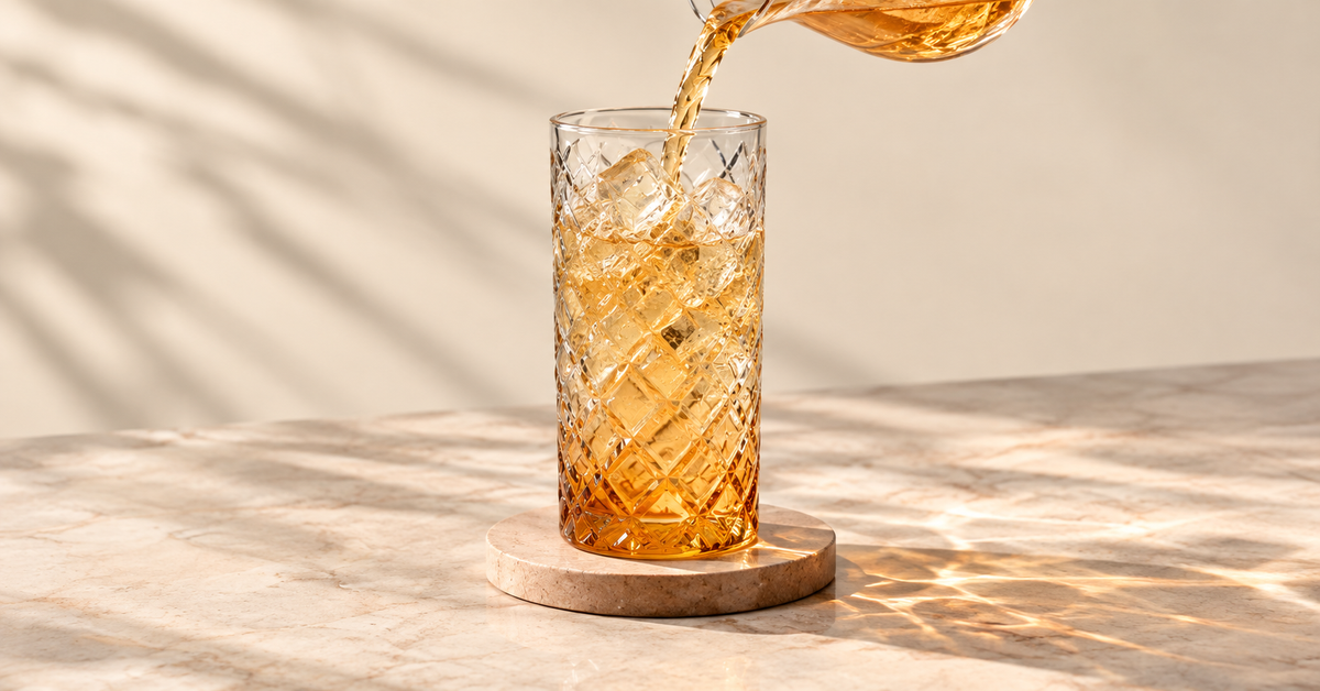 Alpine Timber Glass with a drink on a sunlit table